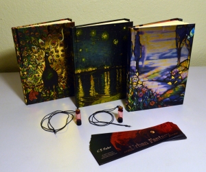 Blank book journals, vial-of-blood necklaces, and bookmarks